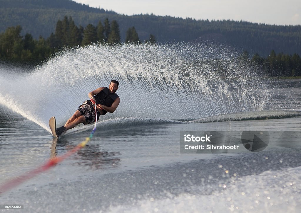 Mid forties male waterskiing Waterskiing Stock Photo