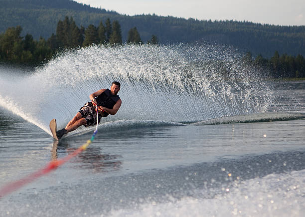 Mid forties male waterskiing stock photo