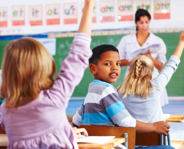 istock Smart little African American school boy smiling 182173450
