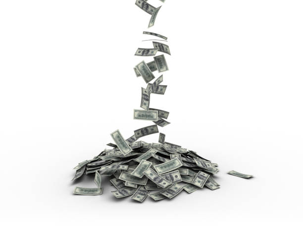 istock Lot of US Money Falling 182173491