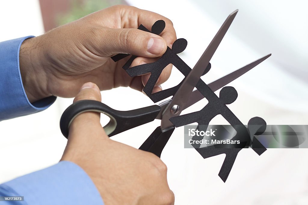 Cutting jobs "Layoffs and downsizing concept, cutting people. You may also like:" Cutting Stock Photo