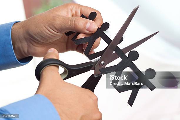 Cutting Jobs Stock Photo - Download Image Now - Cutting, Paper Chain, Being Fired