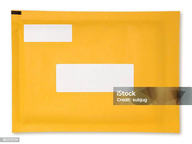 Yellow Padded Envelope With Blank White Labels Stock Photo - Download Image Now - Envelope, Label, Mail