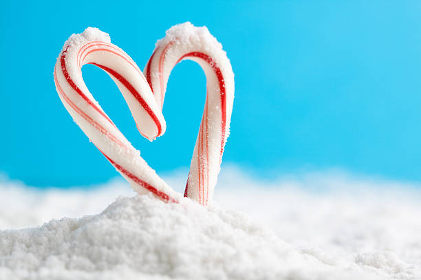 candy cane heart on snow A heart made of candy canes on snow. You may also like: peppermints stock pictures, royalty-free photos & images