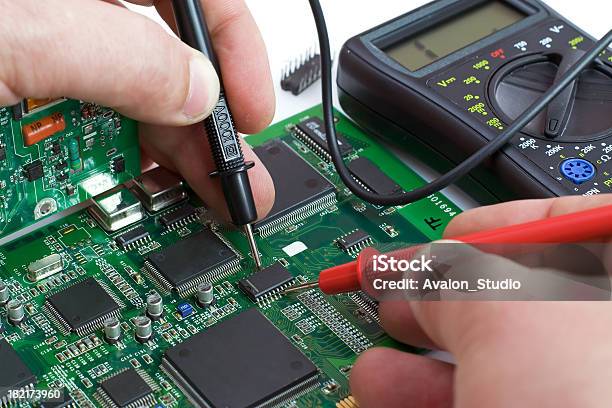 Electronic Technician Stock Photo - Download Image Now - Multimeter, Repairing, Scientific Experiment