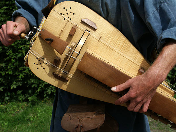 Playing the hurdy-gurdy close-up stock photo