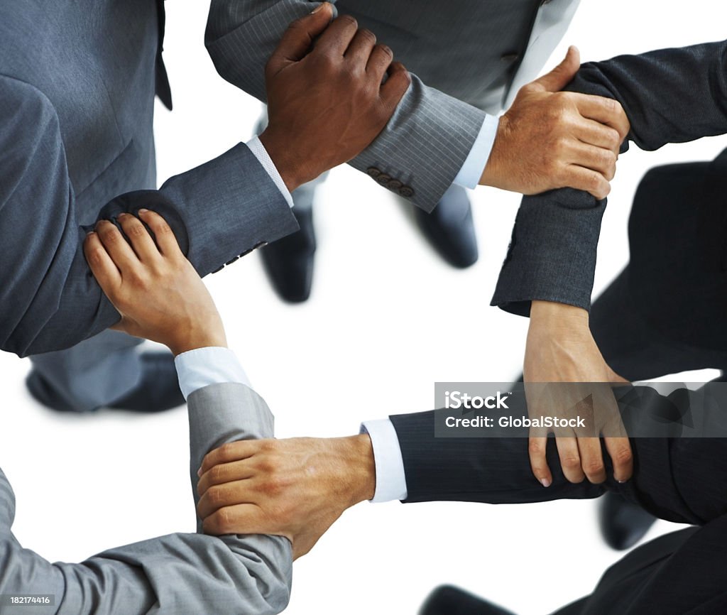 Colegas de trabalho, segurando cada outros mão - Foto de stock de Autoconfiança royalty-free