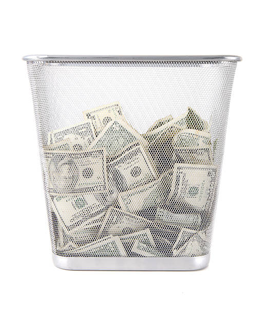 istock Trowing Money Away 182174555