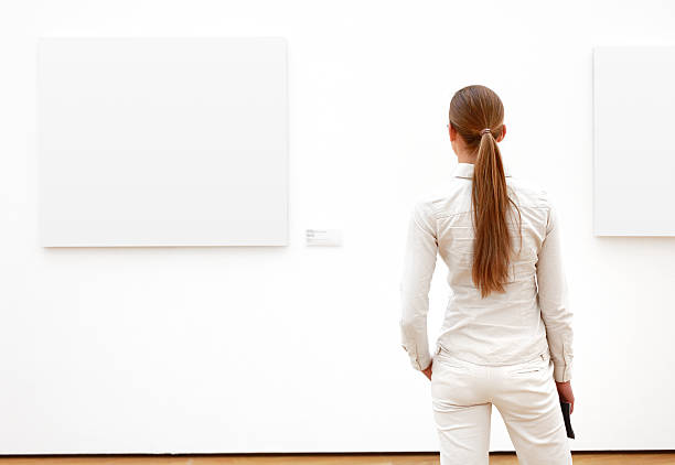 istock woman in a museum (clipping path) 182174629