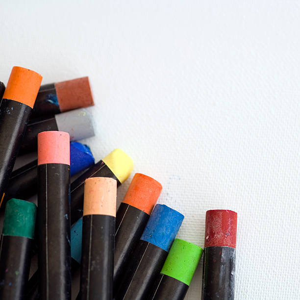 istock Multi coloured artists oil pastels on a white background 182174729