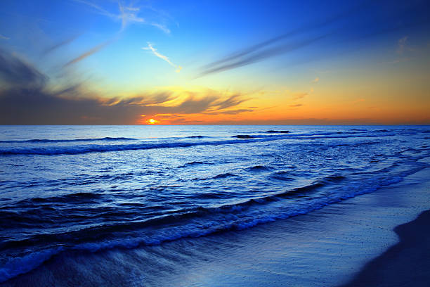 plaża i morze zachód słońca - sunset beach sky heat zdjęcia i obrazy z banku zdjęć