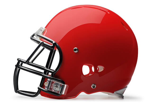 Football Helmet A red football helmet on white background. Clipping path included. helmet stock pictures, royalty-free photos & images