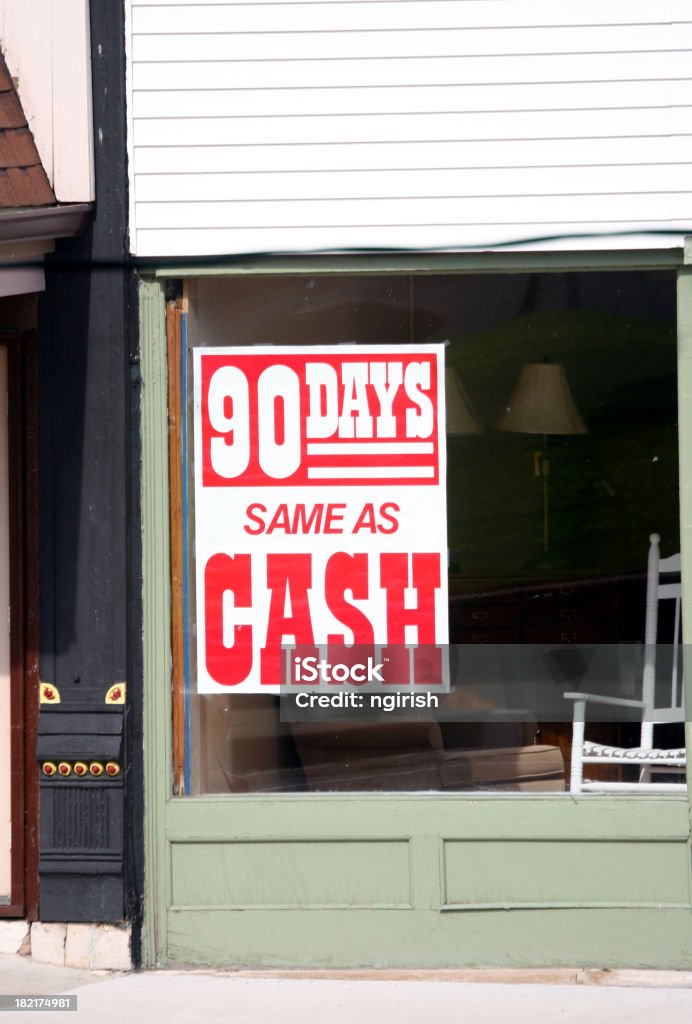 Loan - sign on store window Sale sign - 90 days same as cash 1990-1999 Stock Photo