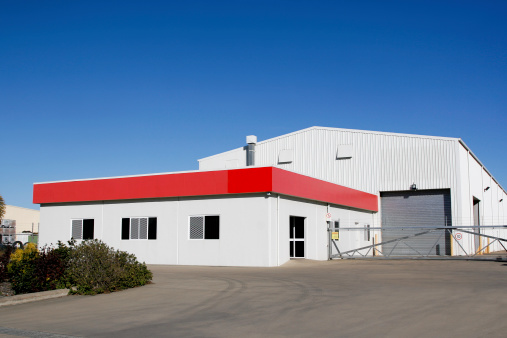 Front exterior of an industrial warehouse building. Click to see more...