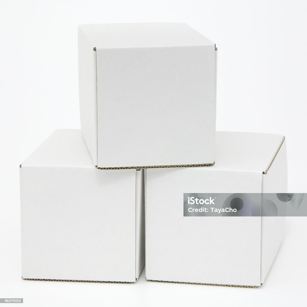 Trois vide blanc cartons isolé - Photo de Blanc libre de droits