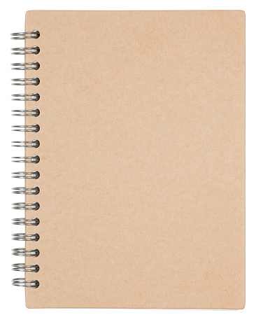 Closed notebook isolated on white. Clipping path included.
