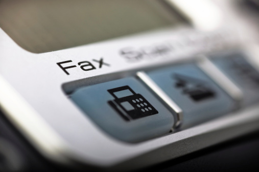 Focus on fax. Very shallow DOF.