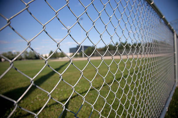 Chainlink Fence Stock Photo - Download Image Now - Chainlink Fence, Fence,  Sports Field - iStock