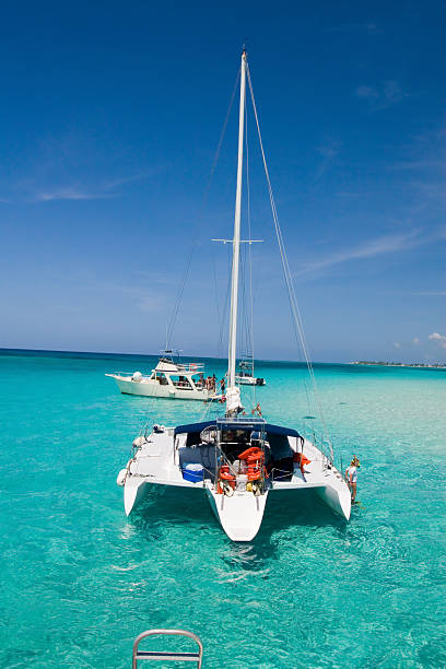 istock boat in the blue sea 182175922