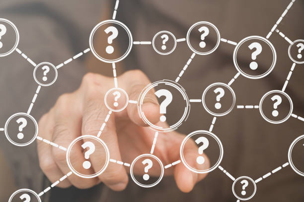 istock Businessman touching a question icon on a virtual screen on a cloud network background. Question mark. FAQ, support, questions and answers. Business concept, help service, Q&A, conversation. 1821760577