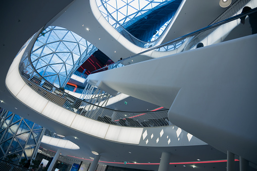 Escalator inside stylish Shopping Mall, Imaged carefully toned to Blue.