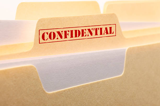 Confidential File A close up of the tab from a confidential file folder. privacy stock pictures, royalty-free photos & images