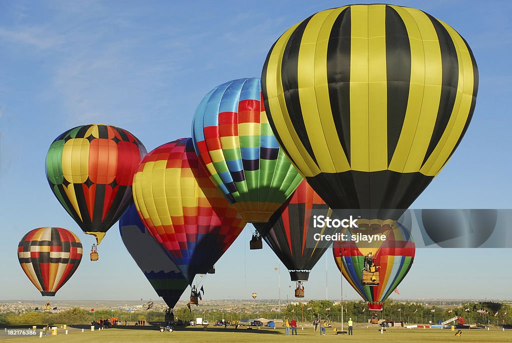Big Yellow "Hot air Balloons taking off and landing at the International Balloon Festival, Albuquerque, New Mexico" Hot Air Balloon Stock Photo