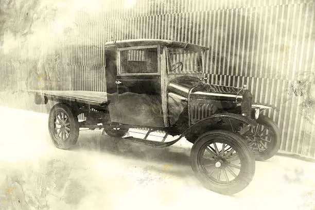 Photo of Old fashioned black and white photo of old car