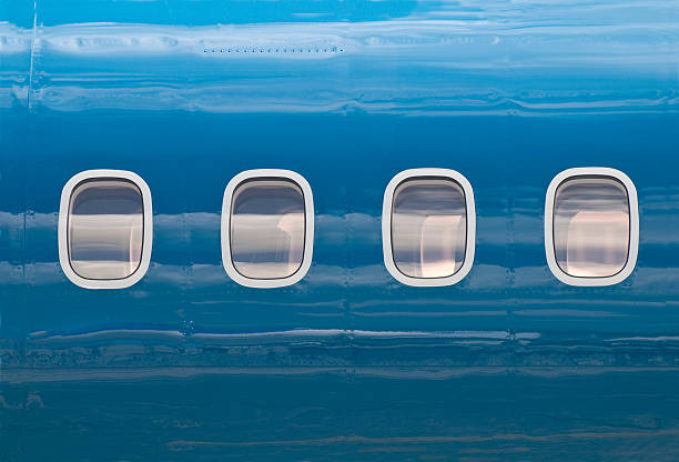 Windows Side view of an airplane fuselage stock pictures, royalty-free photos & images