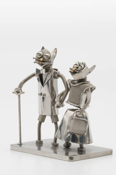 istock Anthropomorphic cat elderly couple metal figures 1821765911