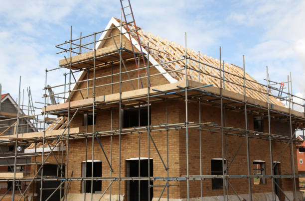 istock New houses under construction on a building site 182176727