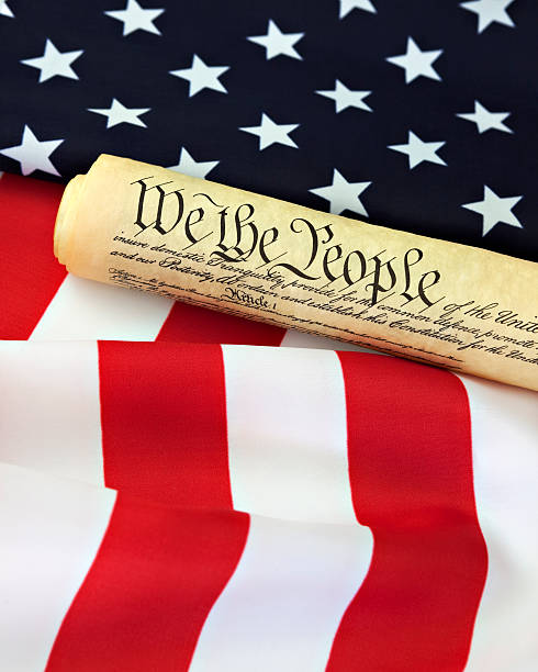 istock Constitution and United States flag 182176914