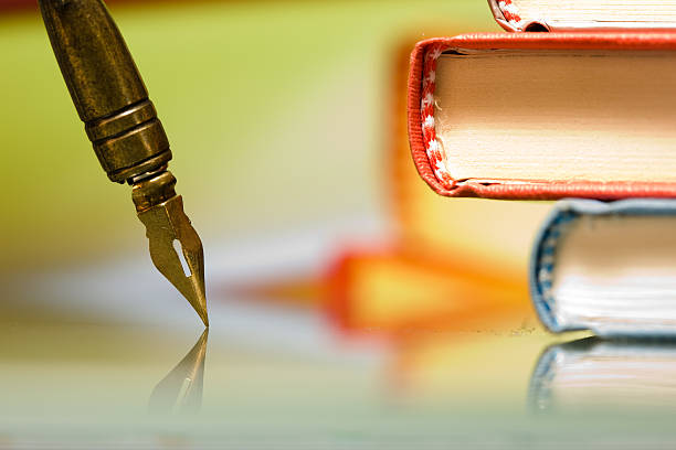 Pencil about to write on yellow piece of paperTo see more of my education images click on the link below