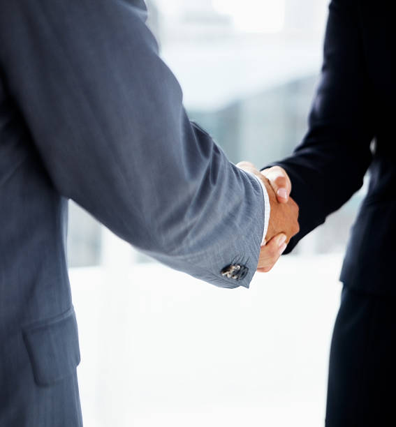 istock Business colleagues shaking hands 182177395