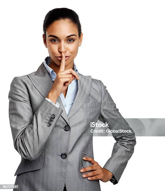 Mulher De Negócios Gesticular Com O Dedo Nos Lábios - Fotografias de stock e mais imagens de 20-24 Anos