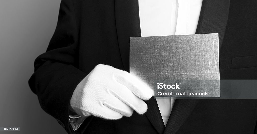 Butler with blank card Invitation Stock Photo