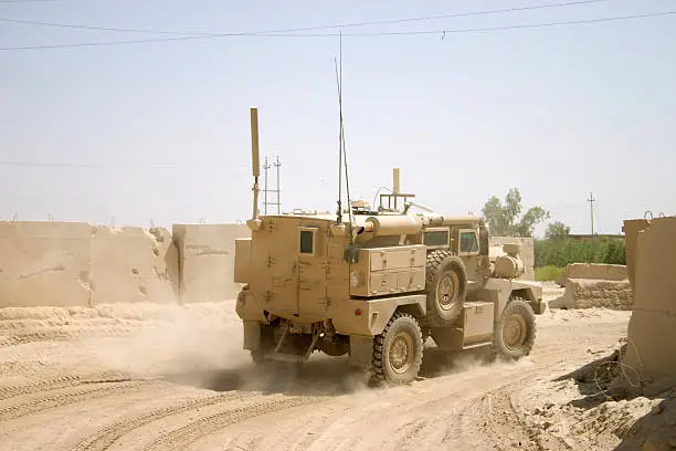 A Specialized anti-IED U.S. truck goes on patrol.