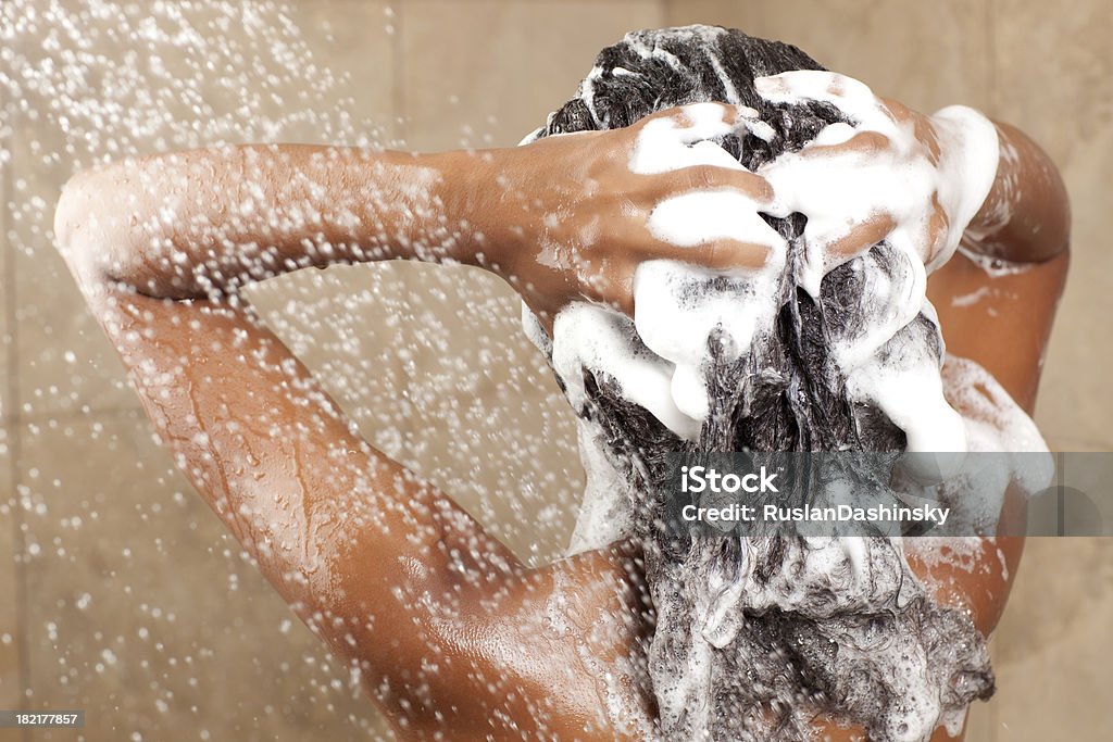 Woman washing her hair with shampoo "Woman washing her hair with shampoo, rear view.Similar images preview:" Washing Hair Stock Photo