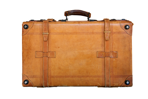 Classic style genuine leather suitcase isolated on white.