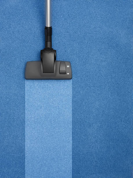 blue carpet being cleaned with stripe stock photo