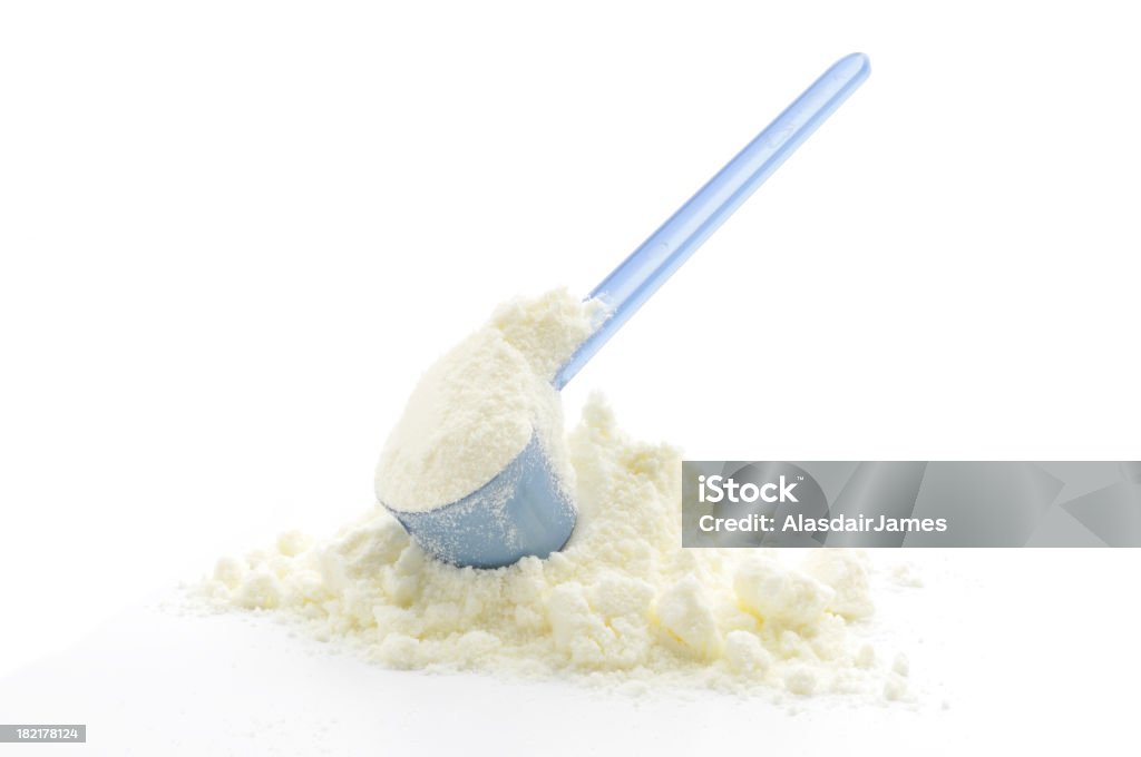 Leite fórmula pilha e pá - Foto de stock de Colher para servir sorvete royalty-free