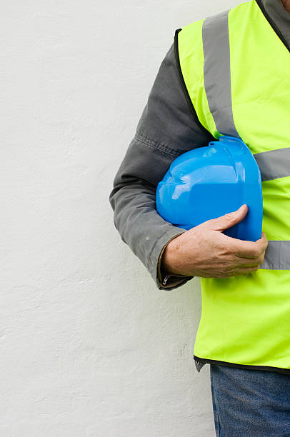 istock Constuction Worker With Hi-Visibilty Safety  Jacket and Hard Hat. 182178188