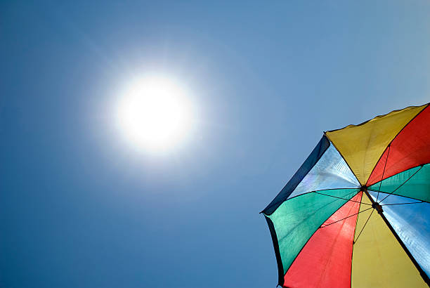 istock Colorful umbrella and sun 182178217