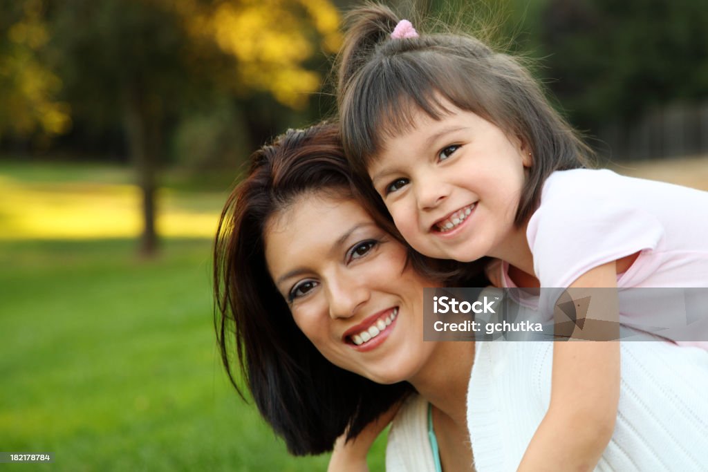 Happy Mother And Daughter Mother and daughter outdoors in the park. 20-29 Years Stock Photo