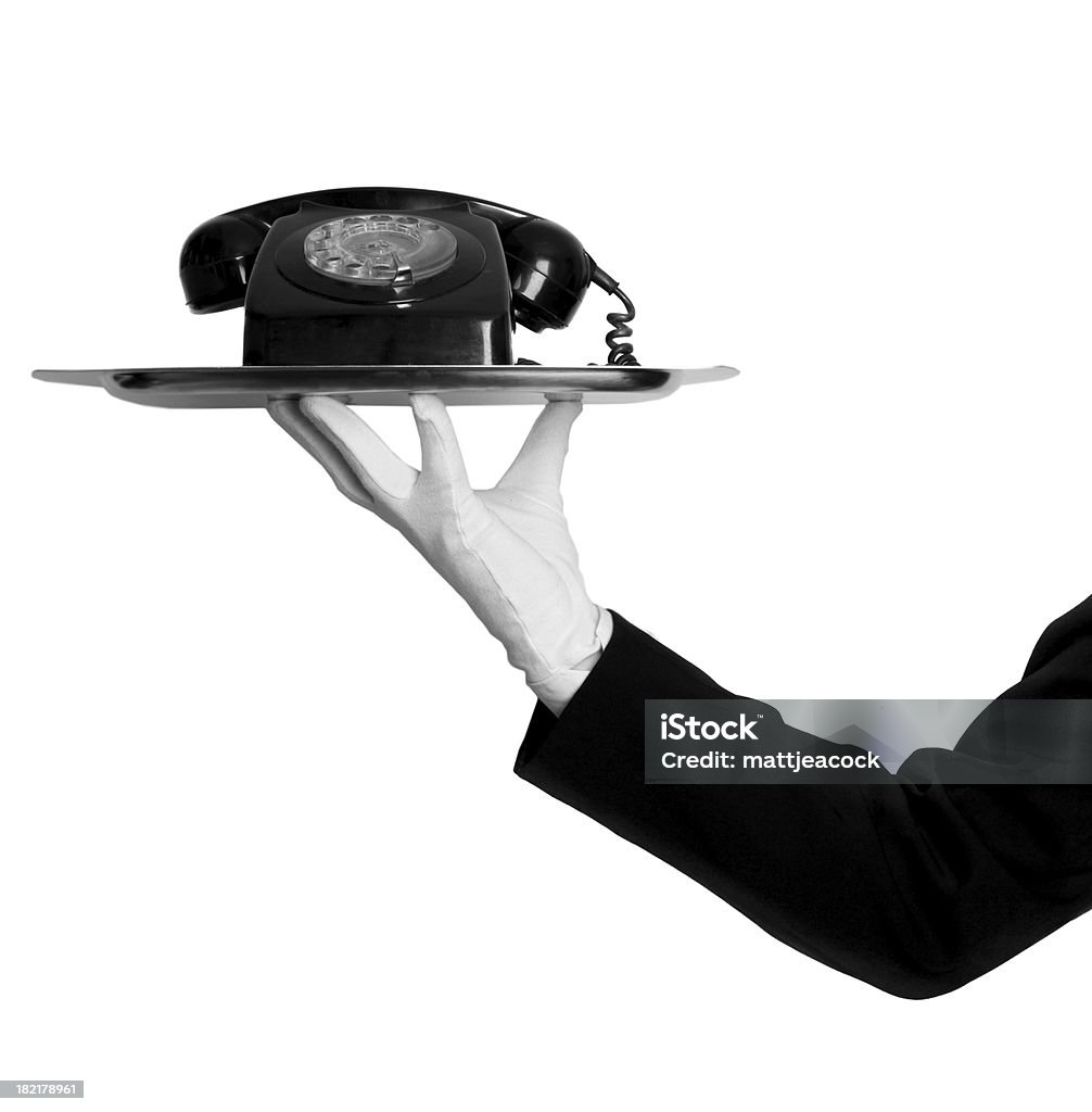 Butler con teléfono - Foto de stock de Contact Us - Frase en inglés libre de derechos