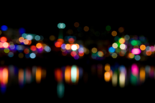 Defocused city lights with reflection