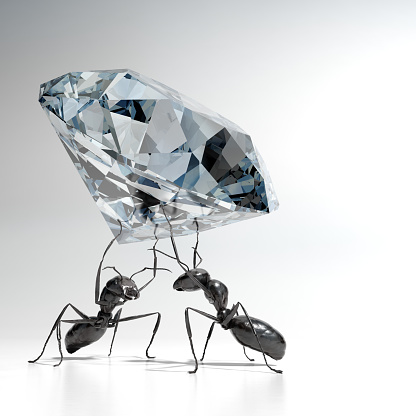 Two ants co-operating to carry a very large diamond. Very high resolution 3D render.