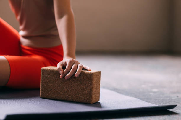 istock Anonymous Woman Sitting on a Yoga Mat 1821794360