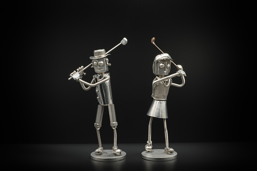 couple golfer metal figures