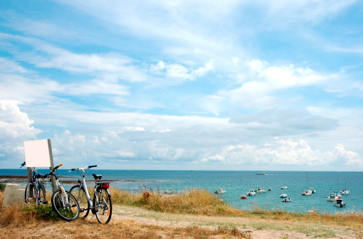 Two bikes in front of a preserved beach in Brittany.I like my bike Lightbox: